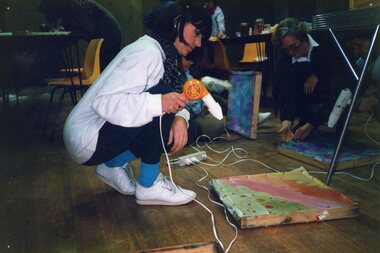 Photograph, Lady drying artwork at Park Orchards Community House, Unknown date
