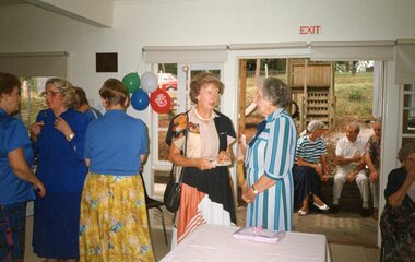 Photograph, Group of celebrating people at Park Orchards Community House, Unknown date