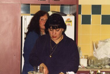 Photograph, Lady in kitchen at Park Orchards Community House, Unknown date
