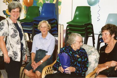 Photograph, Lady talking to Vima at Vima's 100th birthday celebration at Park Orchards Community House, Circa 2004