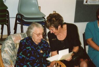 Photograph, Ladies talking to Vima at Vima's 100th birthday celebration at Park Orchards Community House, Circa 2004