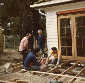 Photograph, Men building extension at POCH, Unknown date