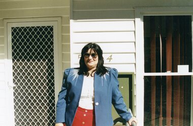 Photograph, Lady at front door of the Park Orchards Community House (POCH)