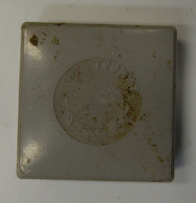 Grey medal case, Grey medal case containing medal from 1963 Victorian Paraplegic Games - Class B Women's 25 metres - 1st Crawl - Pam McCarthy, 1963