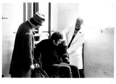 Photo, Nurse, wheelchair bound patient, and physio, 1960s