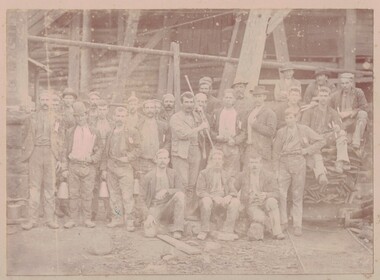 Pitfield miners preparing to go below.