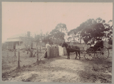 House, horse drawn cart, four people.