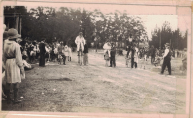 Penny farthing races at sports day.