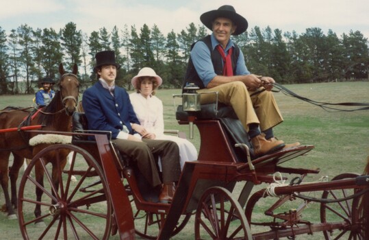 People in horsedrawn carriages.