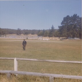 People playing tennis.