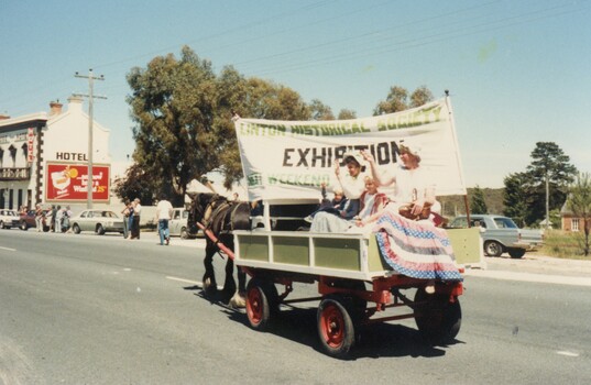 Horse and cart in a parade.