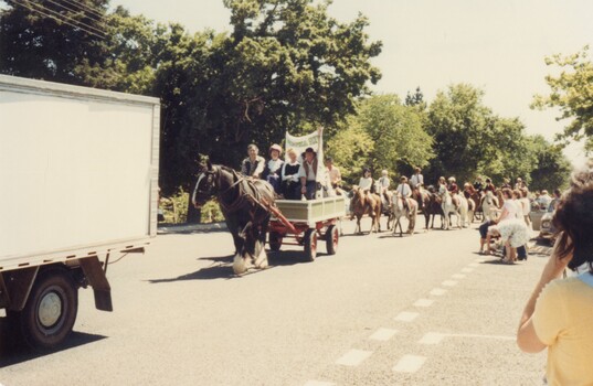 Horse and cart in a parade.