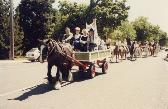 Horse and cart in a parade.