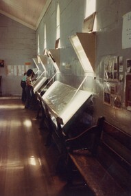 People viewing an exhibition.