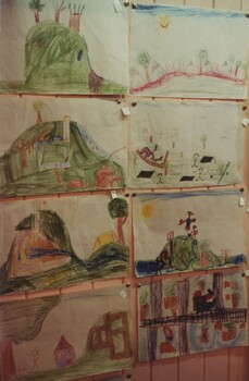 School pupil art work displayed at an exhibition.