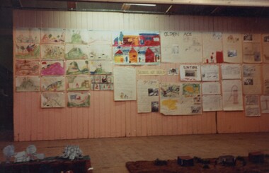 School pupil art work displayed at an exhibition.