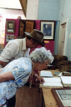 Man and woman at an exhibition.