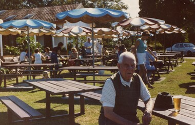 Man sitting at table.