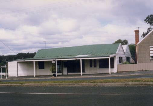 White weatherboard building.