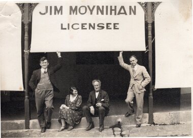 Photograph, Margaret and Jim Moynihan and others outside Moynihan's Hotel