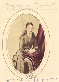 Coloured sepia photograph of a young woman