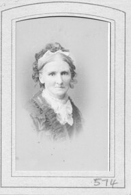 Sepia portrait of a lady wearing decorated top lace fichu at throat.