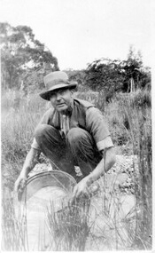 Man panning for gold.