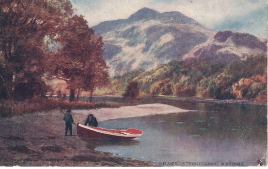 Two people and a boat on a lake.