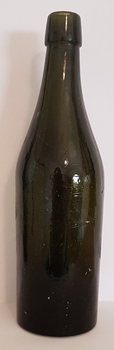 Green glass bottle.