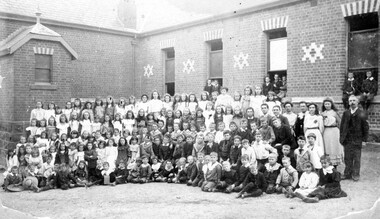 Pupils and teachers at a school.