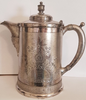 Presentation silver water jug.