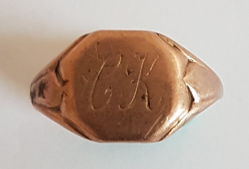 Gold, engraved ring.