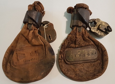 Leather bags with padlocks.