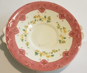 Round, decorative plate.