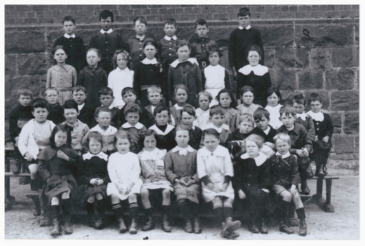 School pupils and a dog.