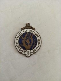 Enameled badge.