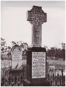 Image of a large headstone.