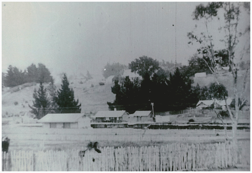 Railway station and house.