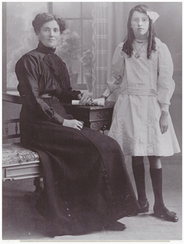 Portrait of a woman with her daughter.