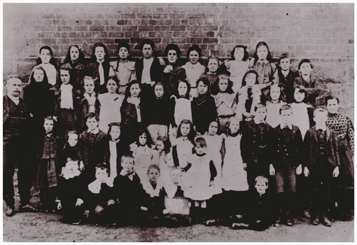 Large group of pupils and teachers.