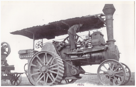 Man on a traction engine.