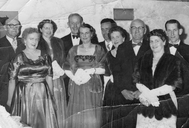 Group of people at a ball.