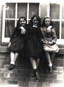 Three girls at school.