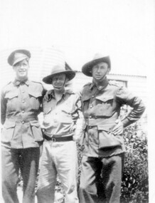 Three men in uniform.