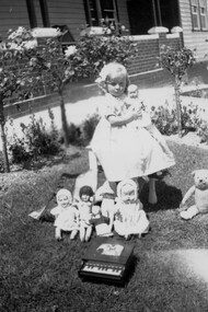 Young child with toys.