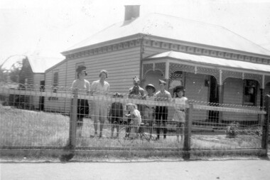 Adults and children in fancy dress.