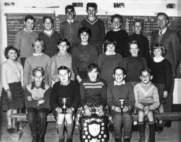 School pupils with trophies.