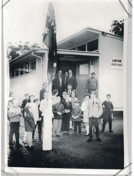 Pupils and teachers at school building opening.