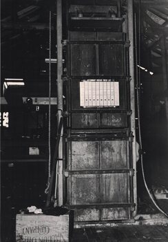 Image of an old wool press.