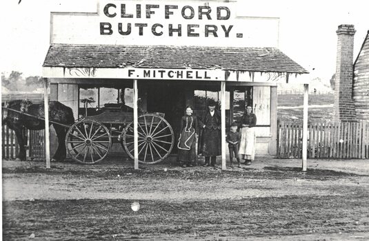 Image of an early butcher shop.